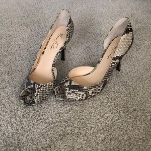 Open toed Marc Fisher snakeskin heels. Gently worn